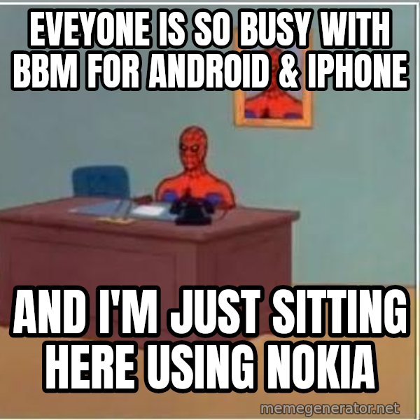 Spiderman Desk meme: eveyone is so busy with bbm for android & iphone / and i'm just sitting here using nokia